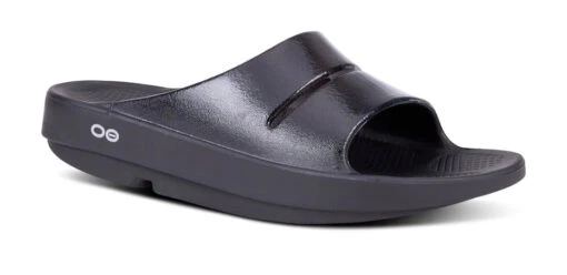 OOfos Women’s OOahh Luxe Slide Sandal (Black) -Hoka Store 1101BLK shot2 932x680 fd5bfb7c 0ae4 4b2c a2fc 00bbcd369ca7